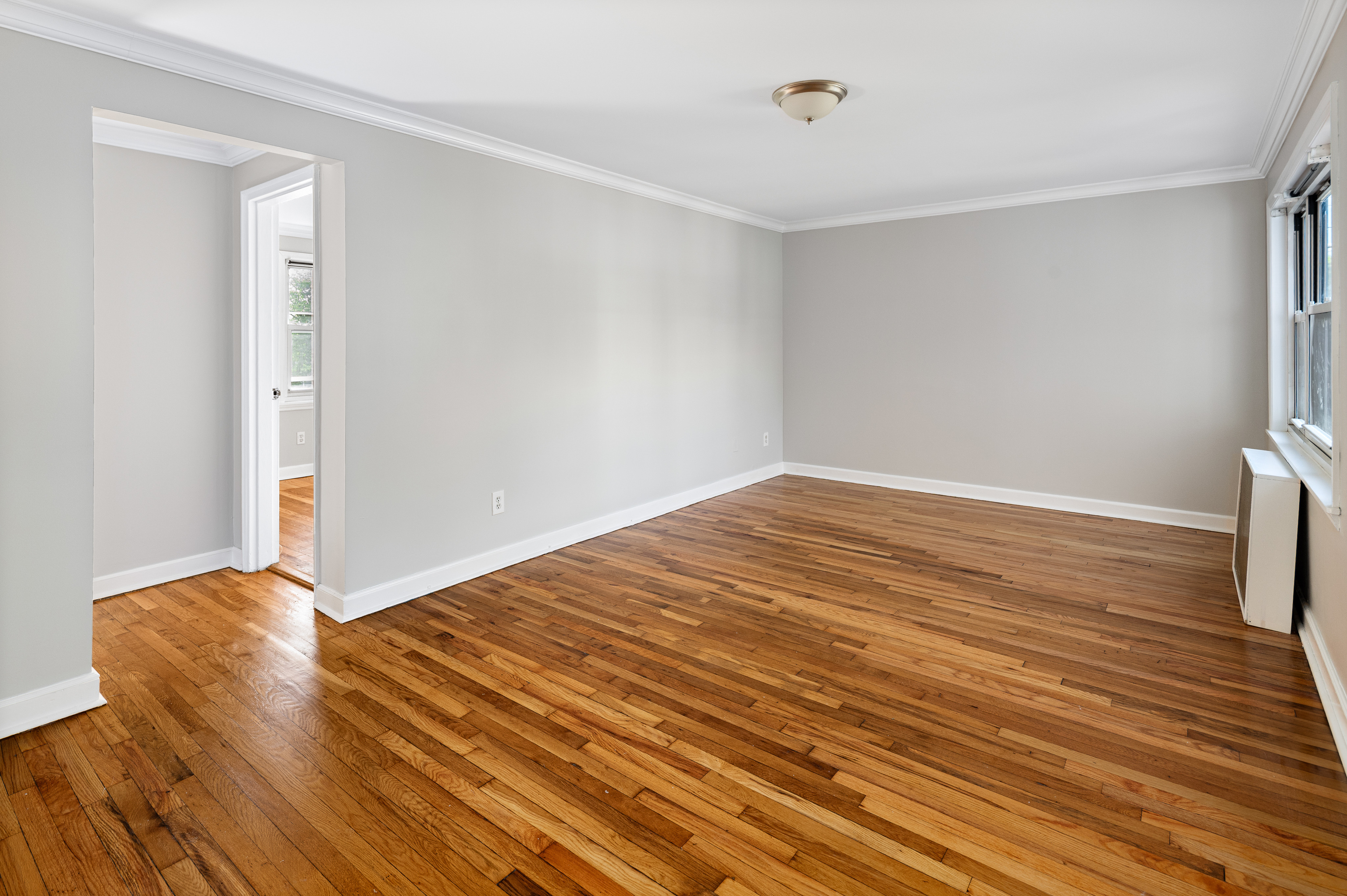 23 Standish Road, Unit 2 Stamford, CT 06902 - Photo 19 of 27 a view of empty room with wooden floor