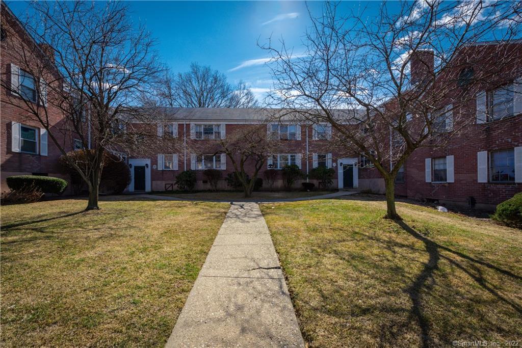 23 Standish Road, Unit 2 Stamford, CT 06902 - Photo 23 of 27 a view of swimming pool with tree in front of it