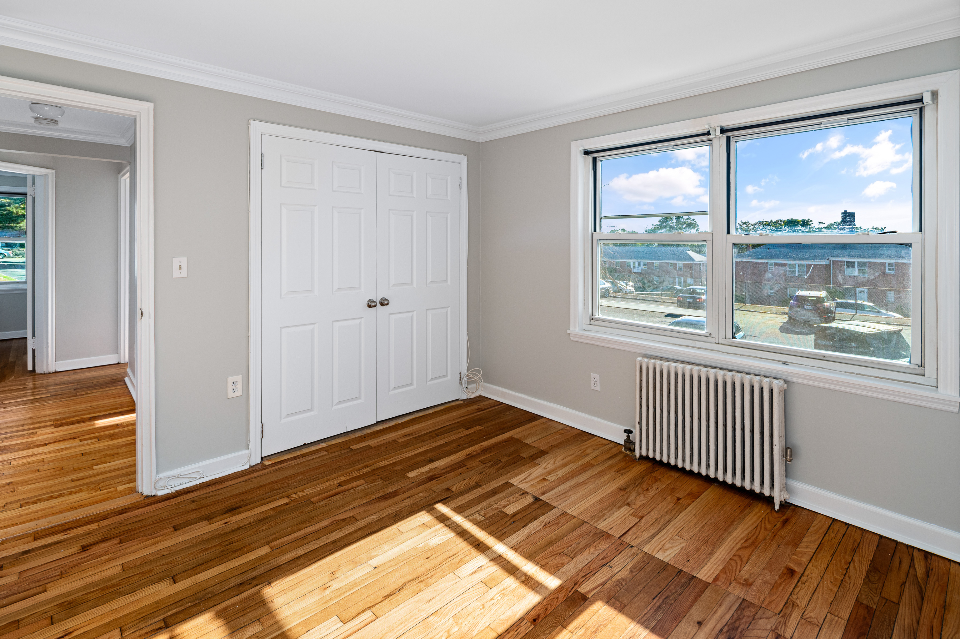 23 Standish Road, Unit 2 Stamford, CT 06902 - Photo 10 of 27 a view of a room with wooden floor and windows