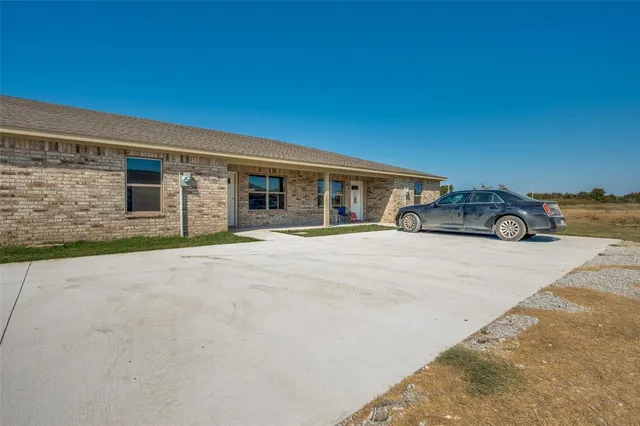 a view of a house with a patio