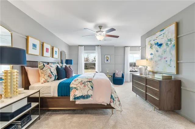 a bedroom with bed and window