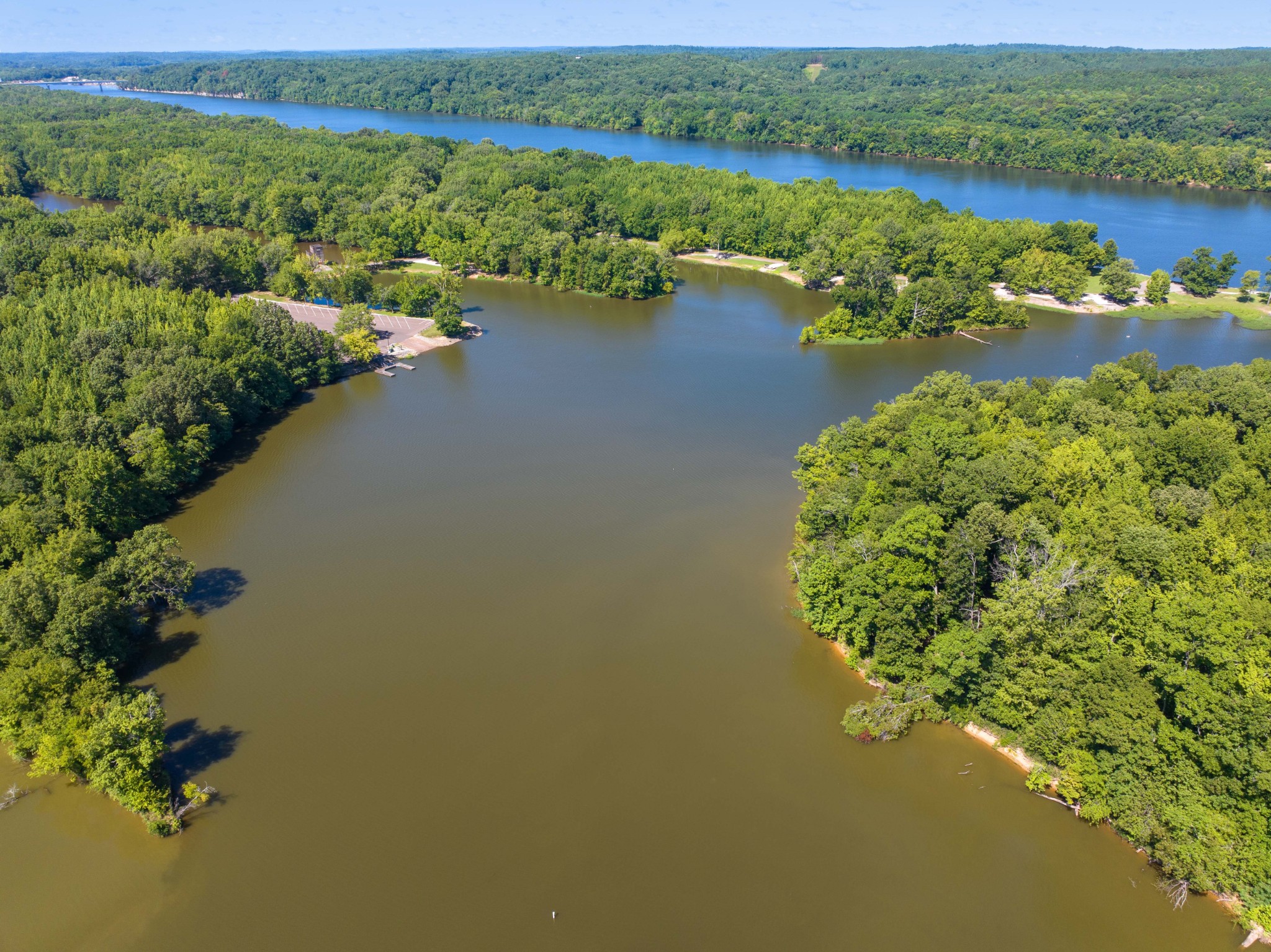 0 Parrish Road Linden, TN 37096 - Photo 18 of 21 an aerial view of green landscape with trees houses and lake view