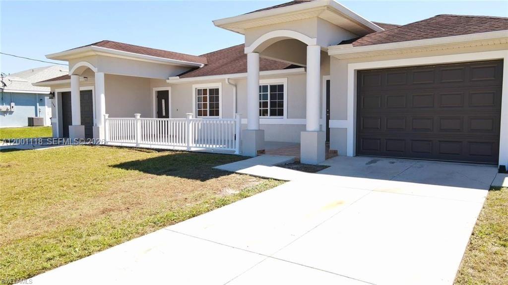 152 Pullman Street, Unit 152 Lehigh Acres, FL 33974 - Photo 2 of 15 a view of a house with swimming pool