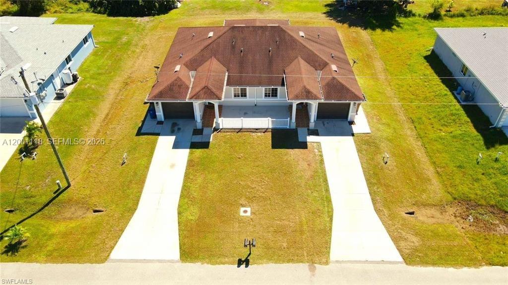 152 Pullman Street, Unit 152 Lehigh Acres, FL 33974 - Photo 3 of 15 a view of a swimming pool