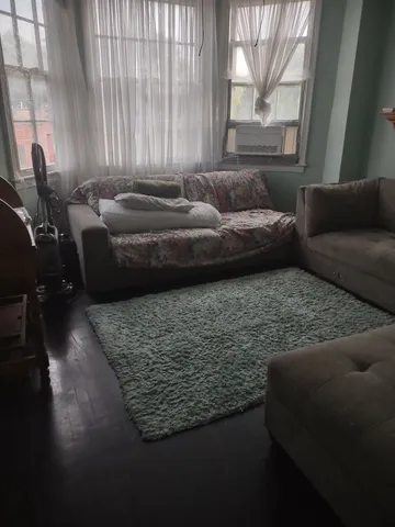 a kitchen with stainless steel appliances granite countertop a refrigerator a sink a stove and a refrigerator