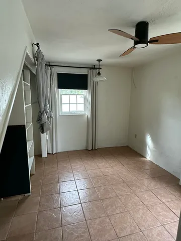 a view of a livingroom with a staircase