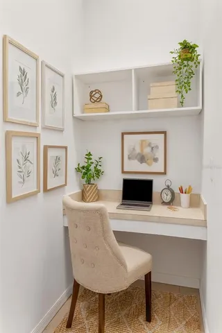 a view of storage and utility room with washer and dryer