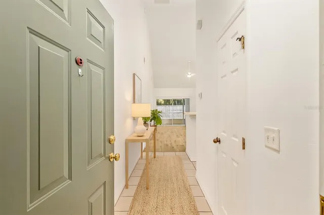 a view of a living room with a wooden floor