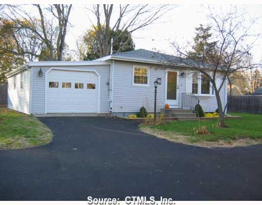 63 Commerce Street Clinton, CT 06413 - Photo 1 of 1 a view of a house with a patio
