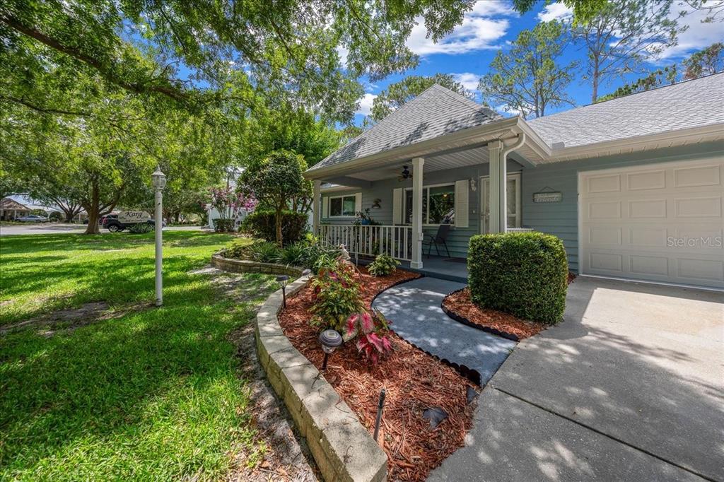 8720 Southwest 90th Street, Unit A Ocala, FL 34481 - Photo 2 of 71 a view of a house with backyard