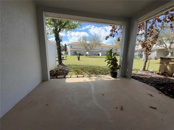 a view of a room with a large window