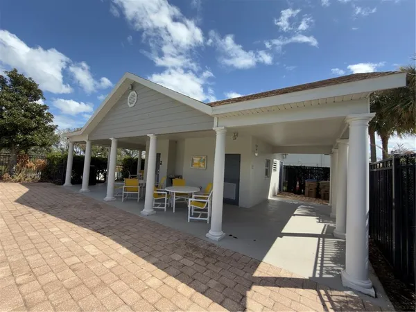 a view of a house with entertaining space
