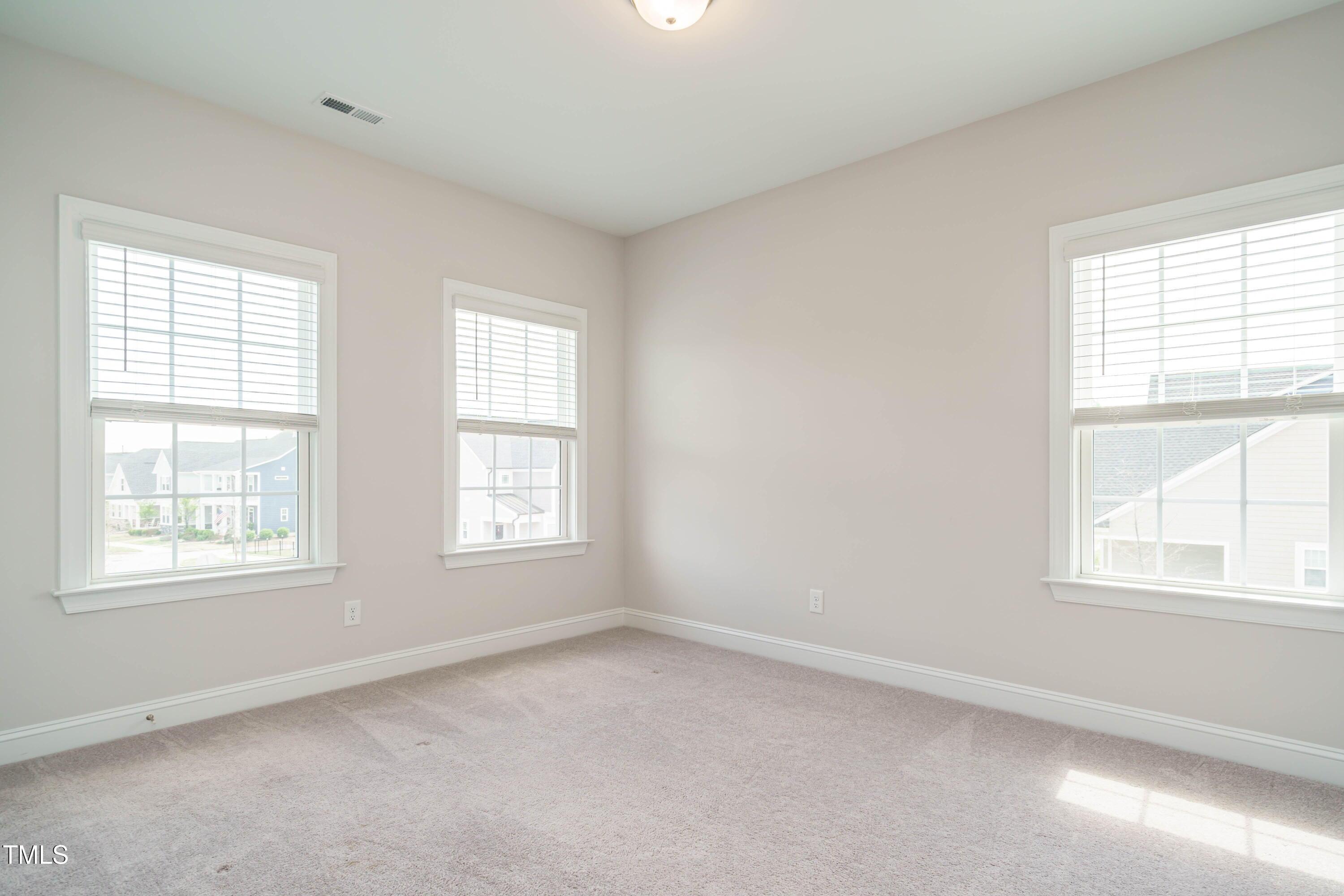 5201 Influence Way Raleigh, NC 27616 - Photo 30 of 33 an empty room with a window