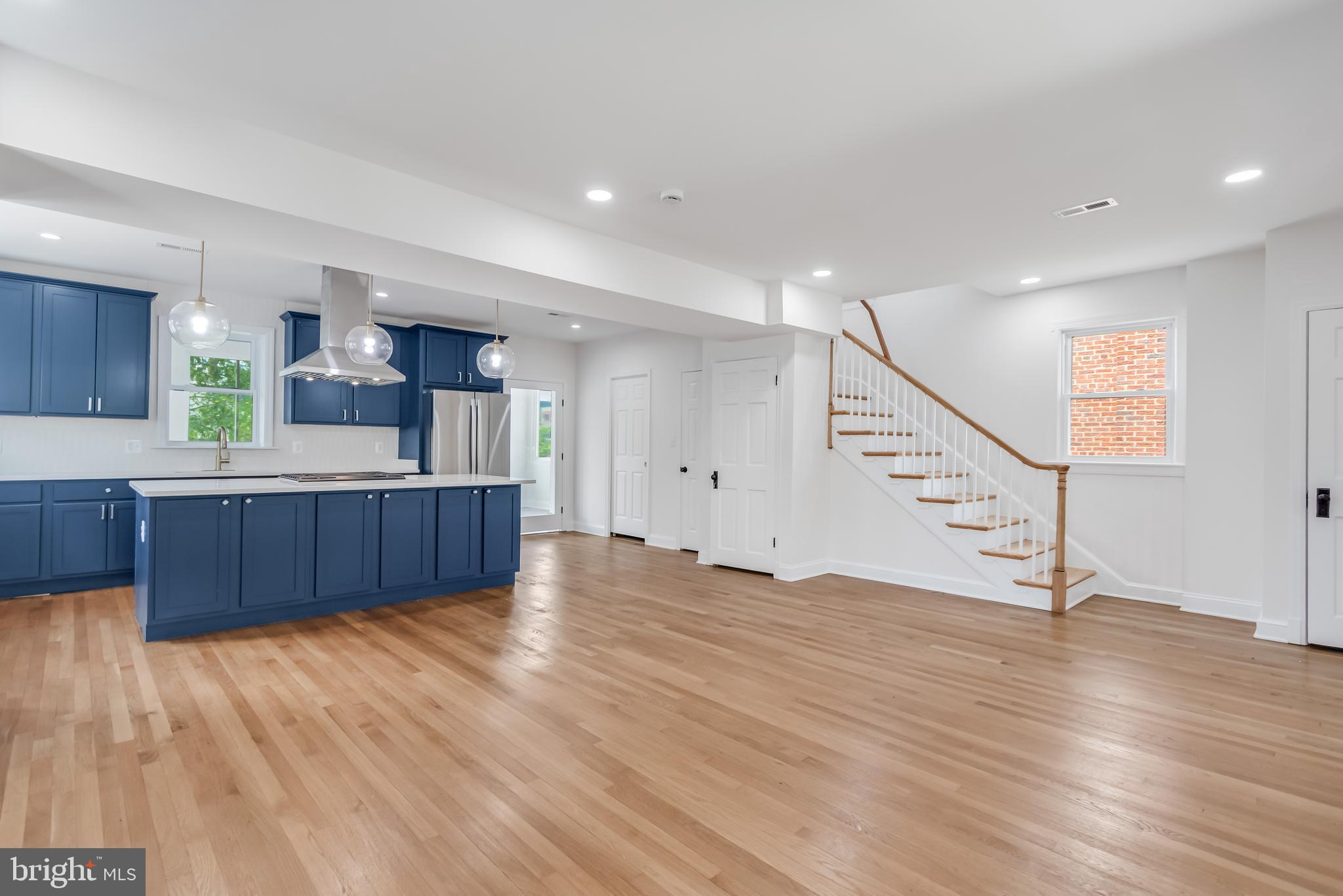 6932 8th Street Northwest Washington, DC 20012 - Photo 21 of 43 a view of kitchen with wooden floor and electronic appliances