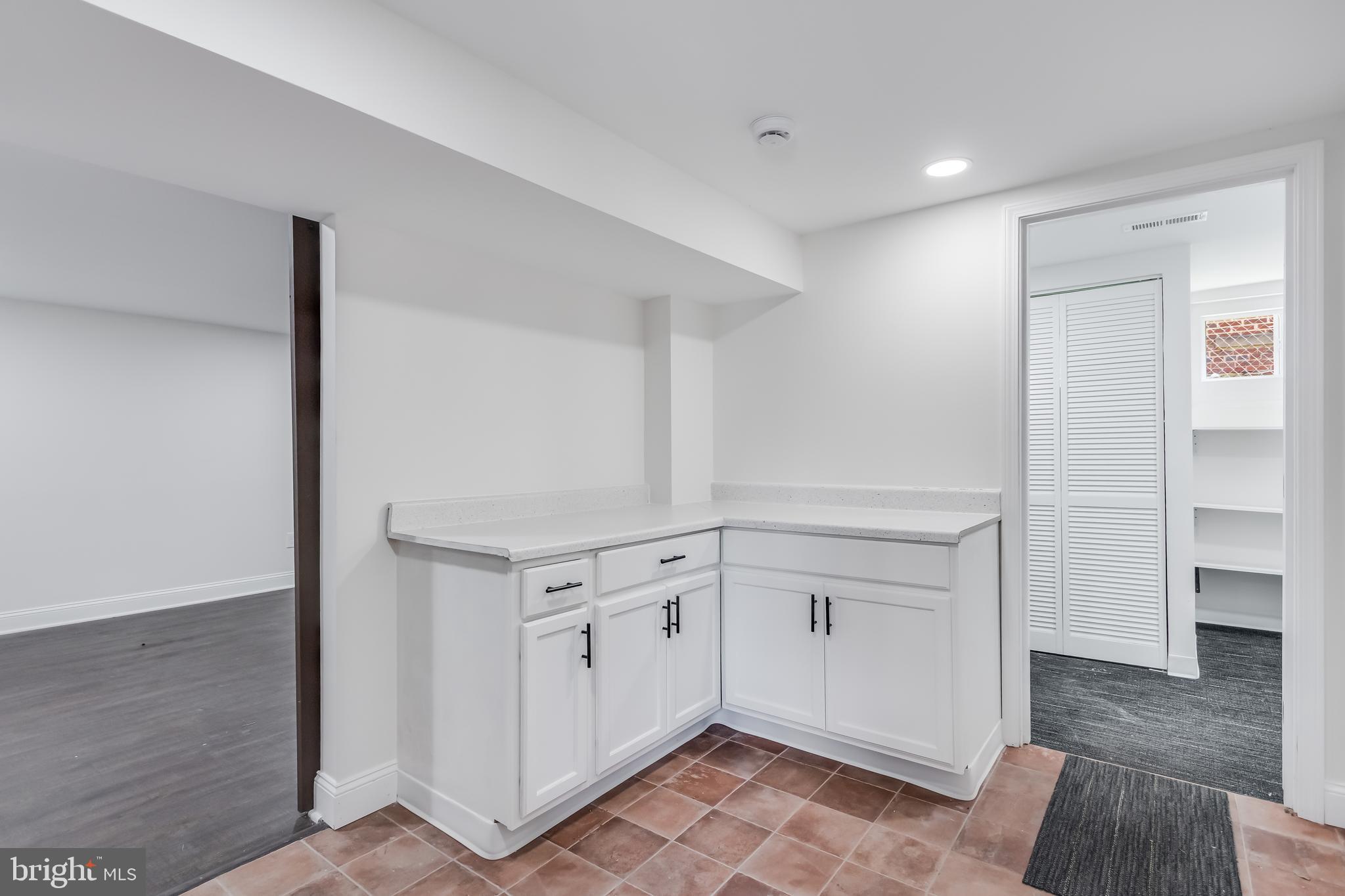 6932 8th Street Northwest Washington, DC 20012 - Photo 37 of 43 a view of a hallway with closet and wooden floor