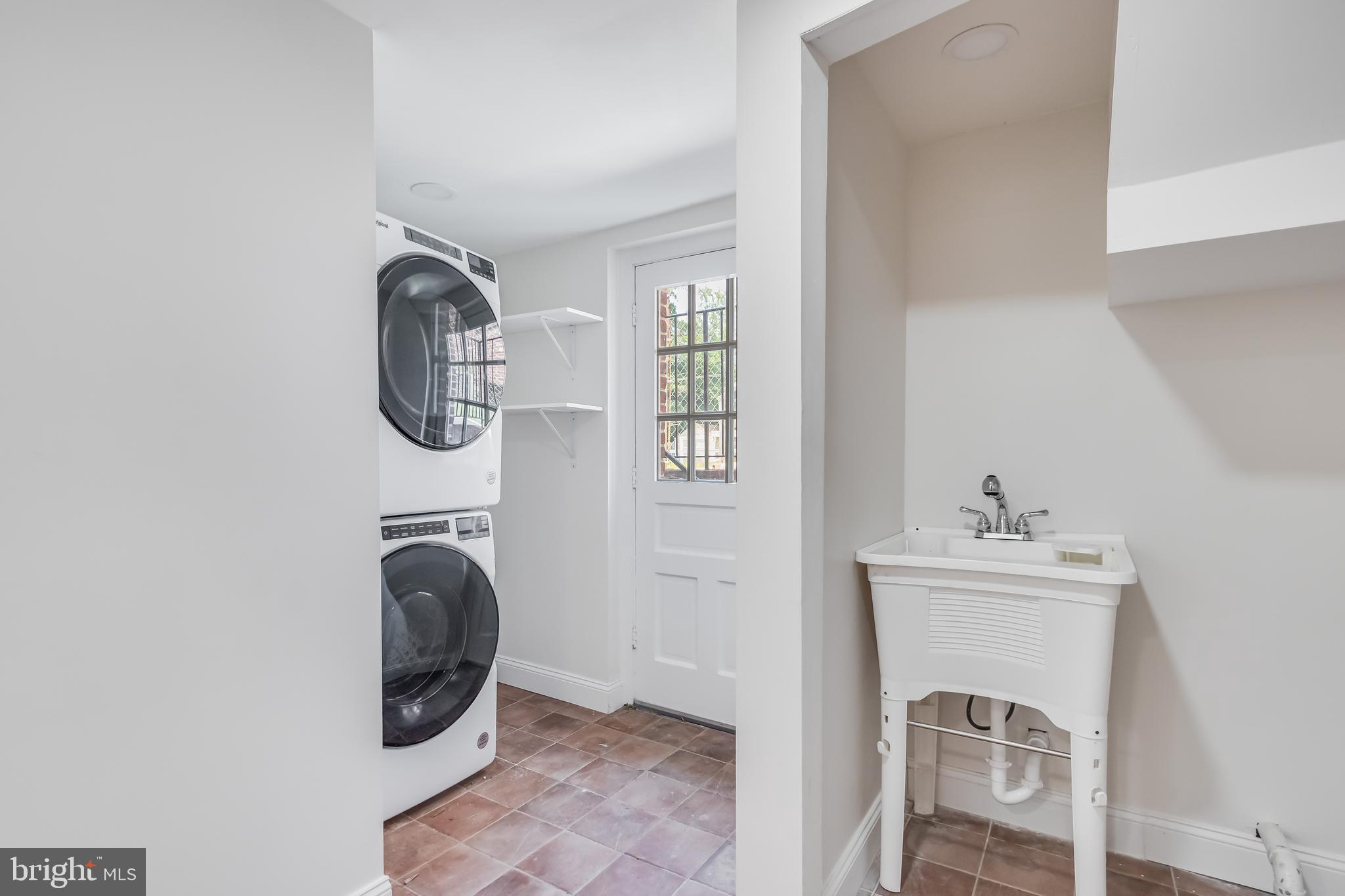 6932 8th Street Northwest Washington, DC 20012 - Photo 40 of 43 a bathroom with a sink and a mirror