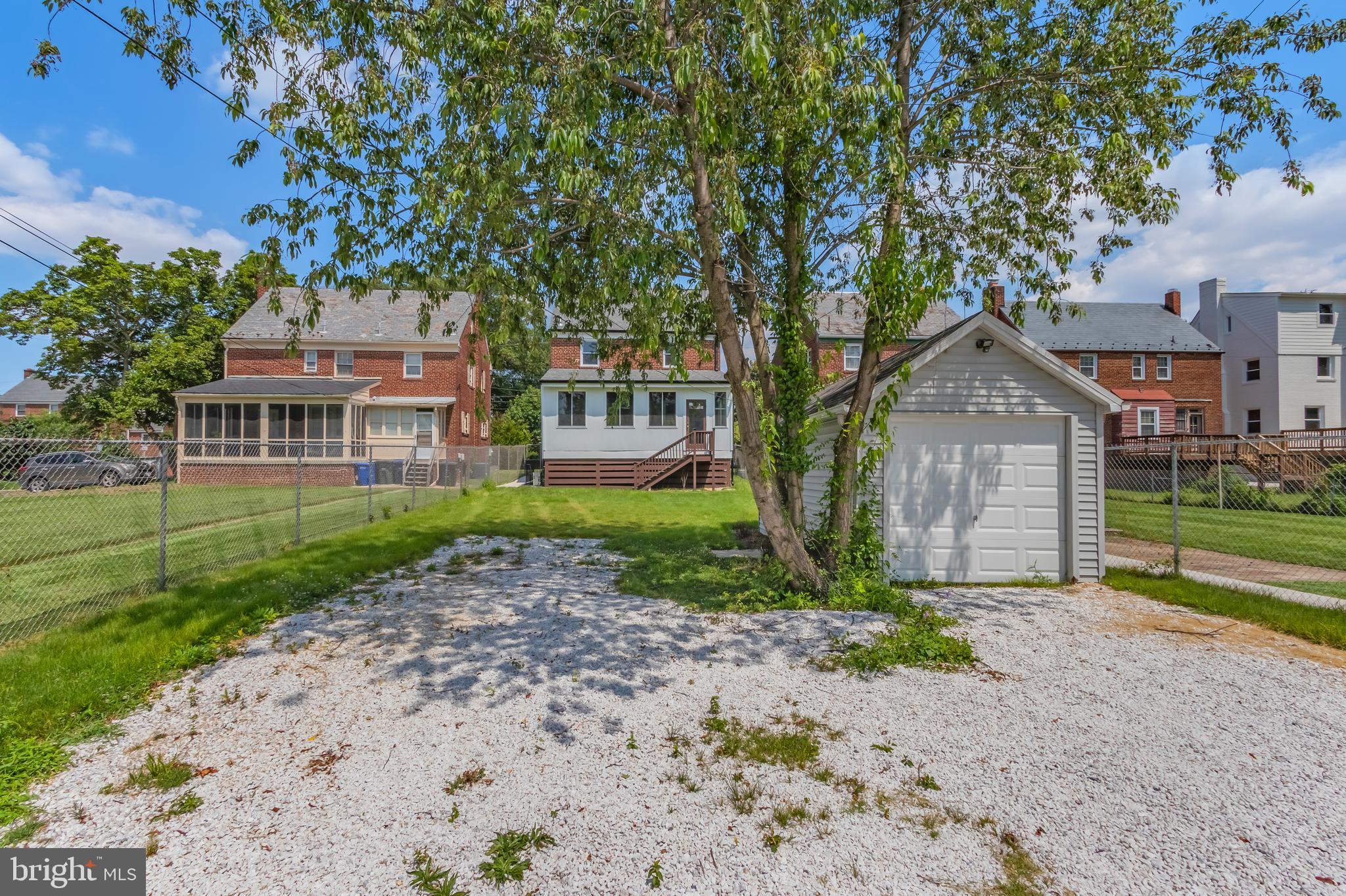 6932 8th Street Northwest Washington, DC 20012 - Photo 42 of 43 a front view of a house with garden