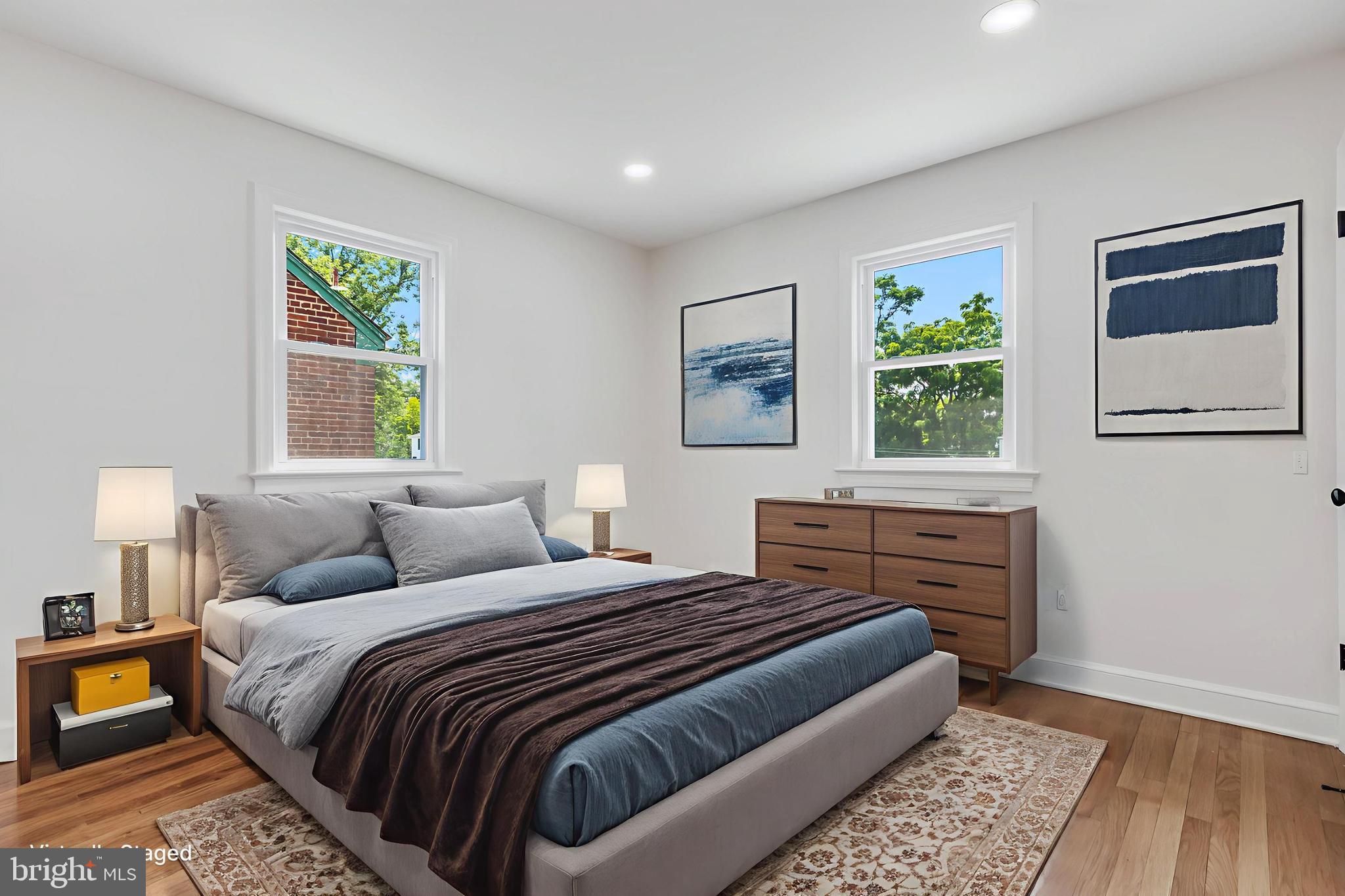 6932 8th Street Northwest Washington, DC 20012 - Photo 8 of 43 a bedroom with a bed and a window