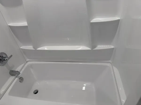 a close view of a bathtub in bathroom