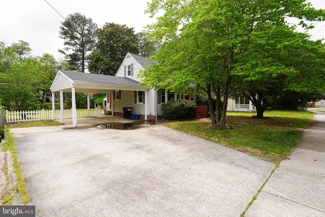 a building with trees in front of it