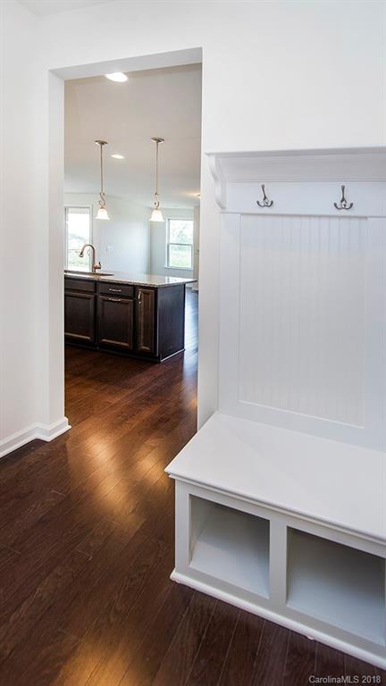 5549 Braddock Ml Way, Unit 264 Lancaster, SC 29720 - Photo 11 of 23 a kitchen with kitchen island a sink and a stove