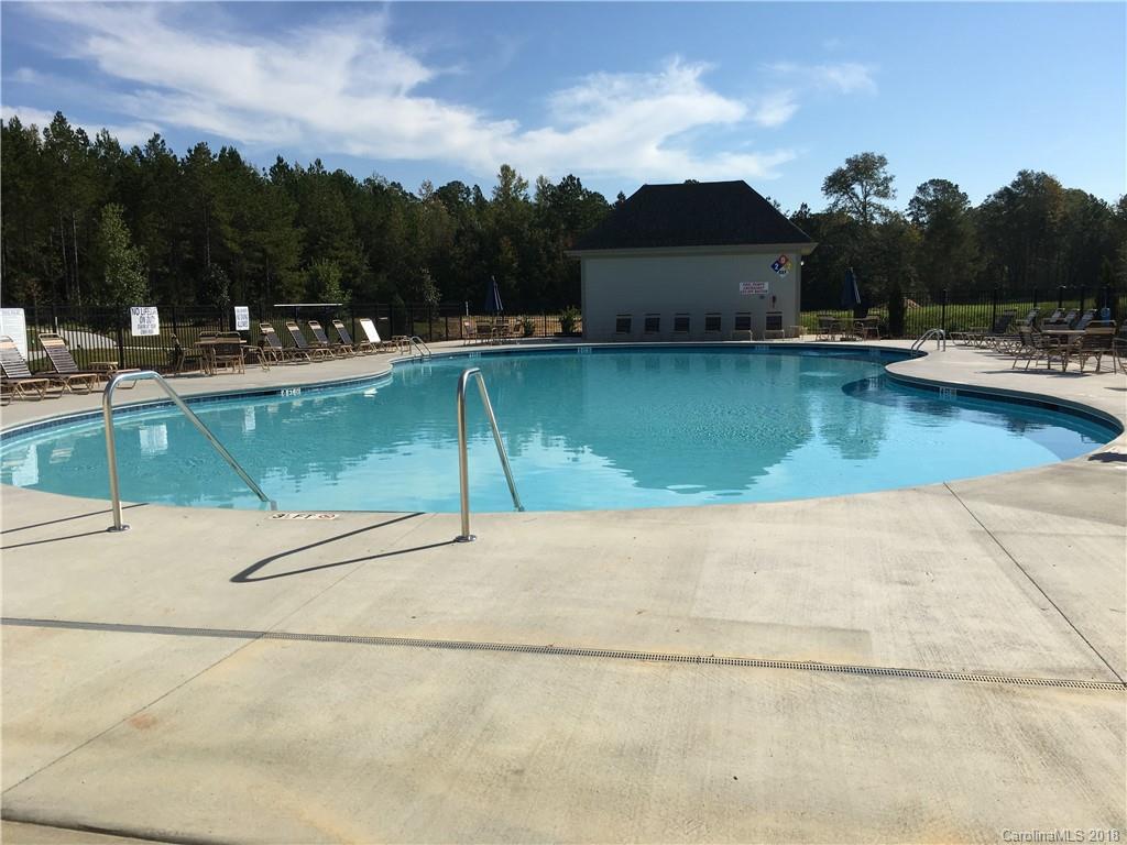 5549 Braddock Ml Way, Unit 264 Lancaster, SC 29720 - Photo 3 of 23 a view of a swimming pool with a yard