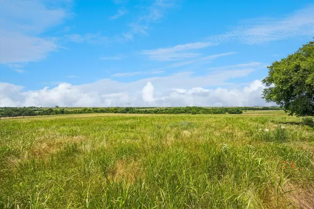 a view of an ocean and a mountain