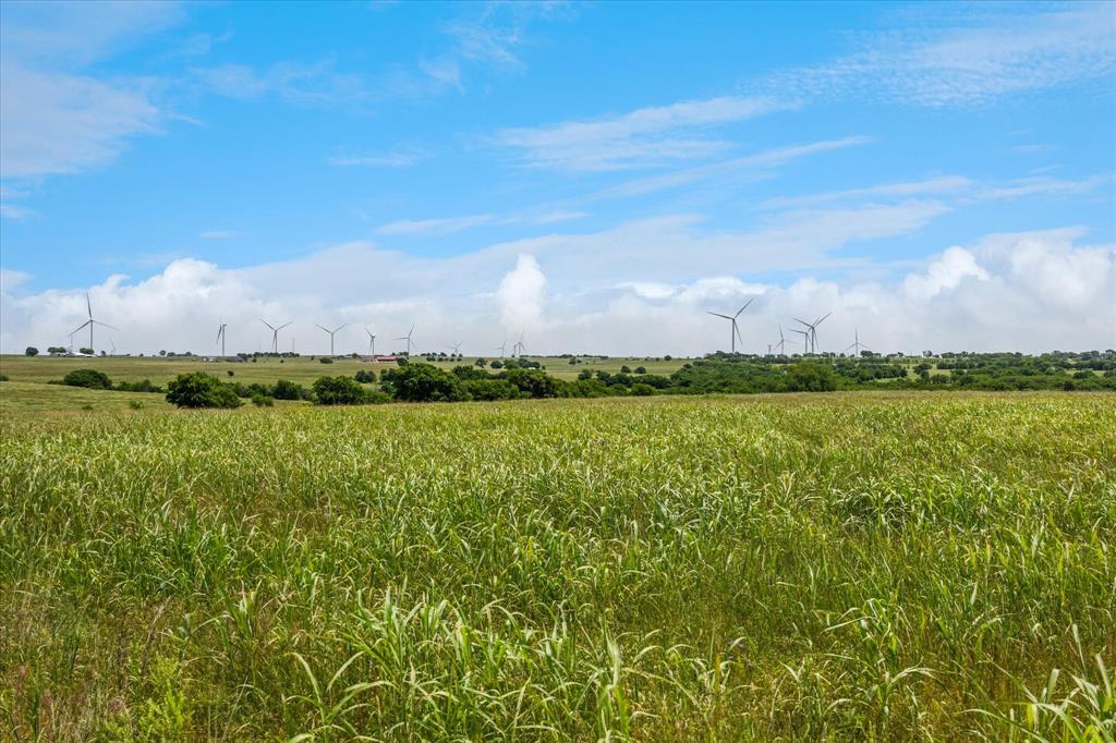 373 FM 373 South Muenster, TX 76252 - Photo 18 of 31 a view of a lake with houses in the background