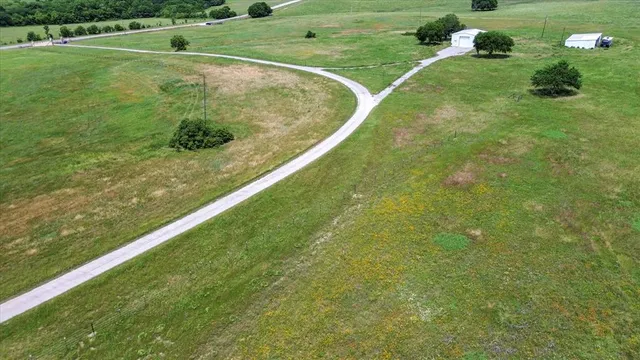a view of a golf course with a garden