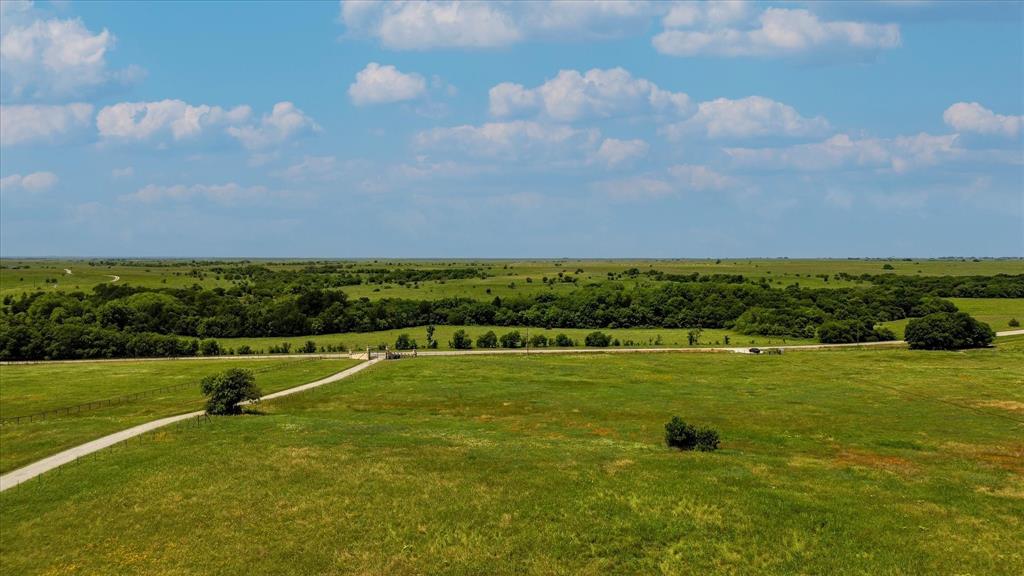 373 FM 373 South Muenster, TX 76252 - Photo 3 of 31 a view of a big yard with a large trees