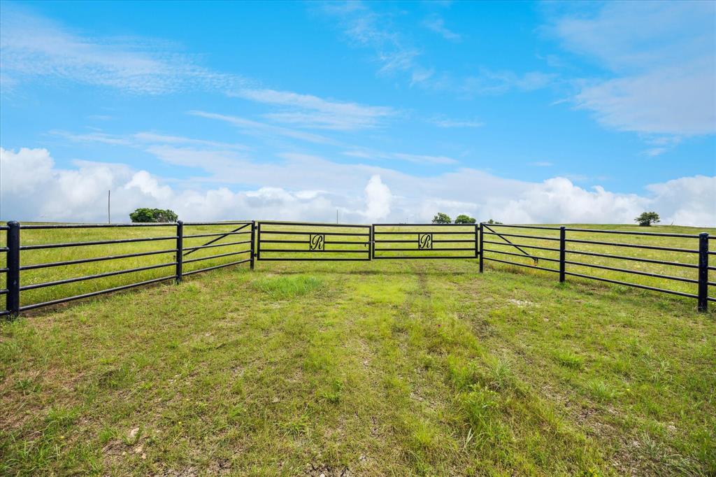373 FM 373 South Muenster, TX 76252 - Photo 4 of 31 a view of a garden with a bench