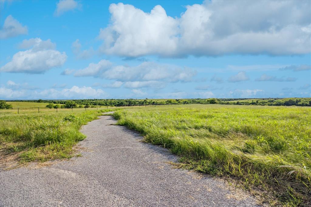 373 FM 373 South Muenster, TX 76252 - Photo 5 of 31 a view of a lake with a big yard