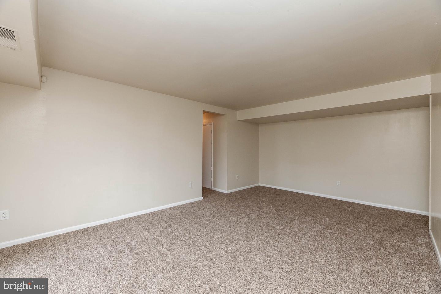 3827 St Barnabas Road, Unit T Suitland, MD 20746 - Photo 10 of 15 Spacious, versatile living area awaits.