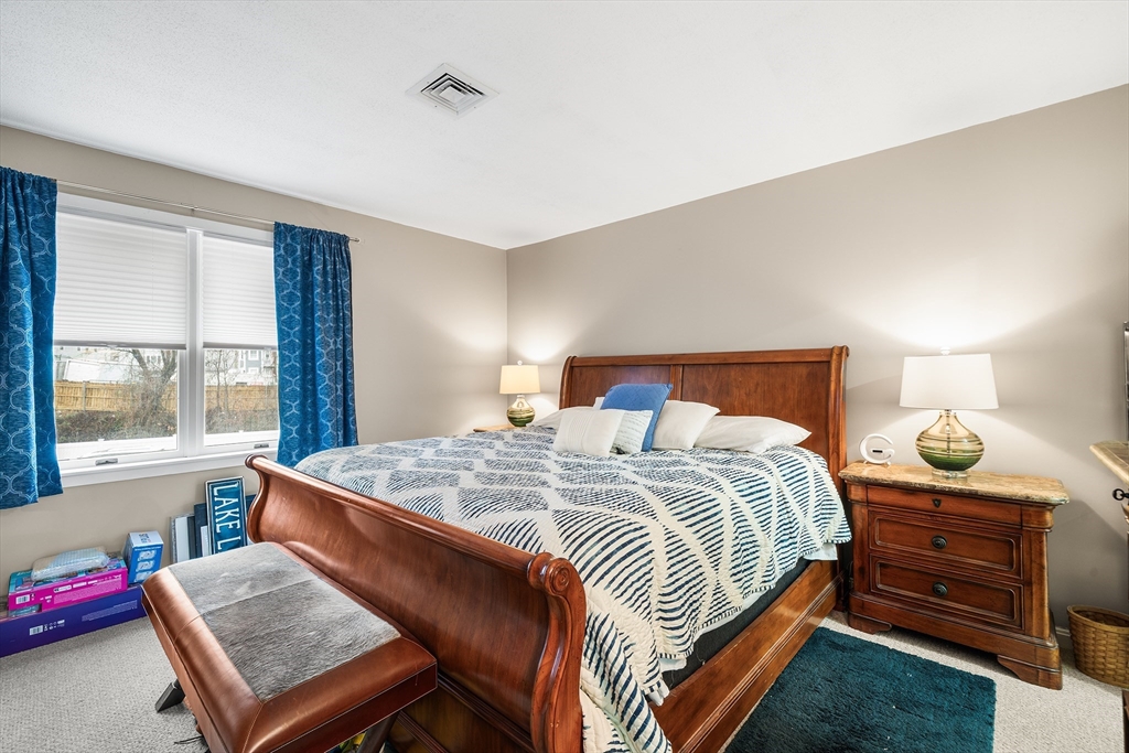 700 Shore Drive, Unit 810 Fall River, MA 02721 - Photo 12 of 22 a bedroom with a bed and a window