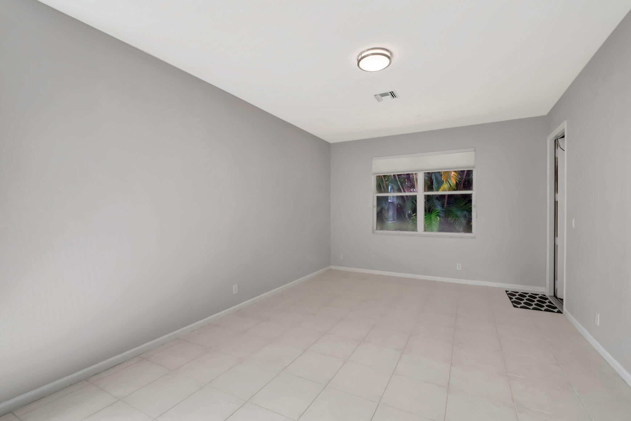 5916 Seashell Terrace Boynton Beach, FL 33437 - Photo 13 of 80 an empty room with windows