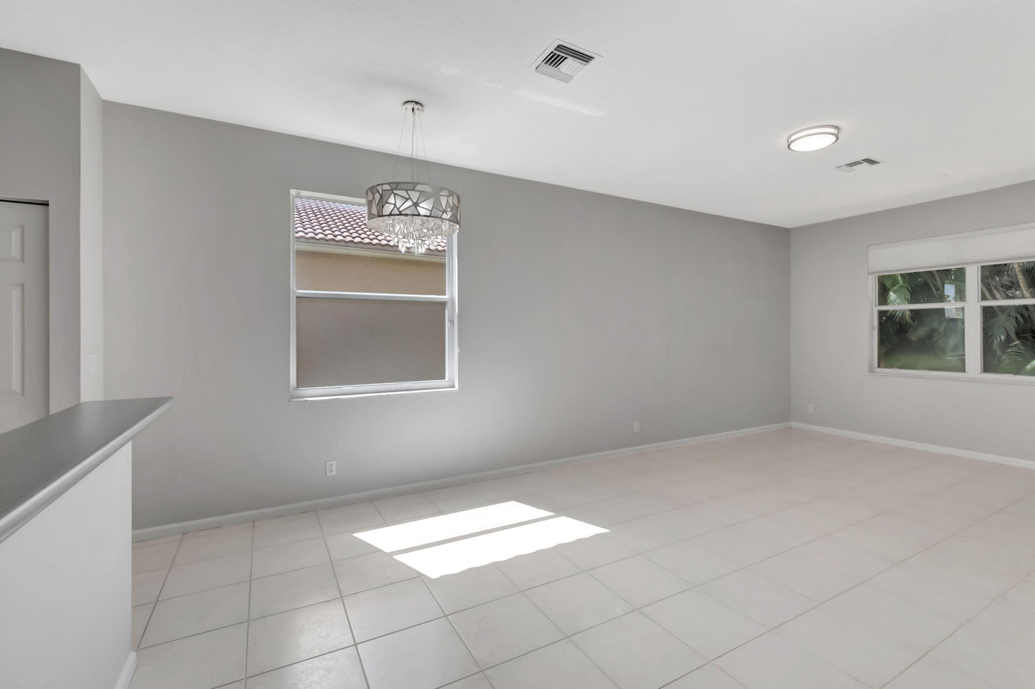 5916 Seashell Terrace Boynton Beach, FL 33437 - Photo 14 of 80 a view of an empty room with a window