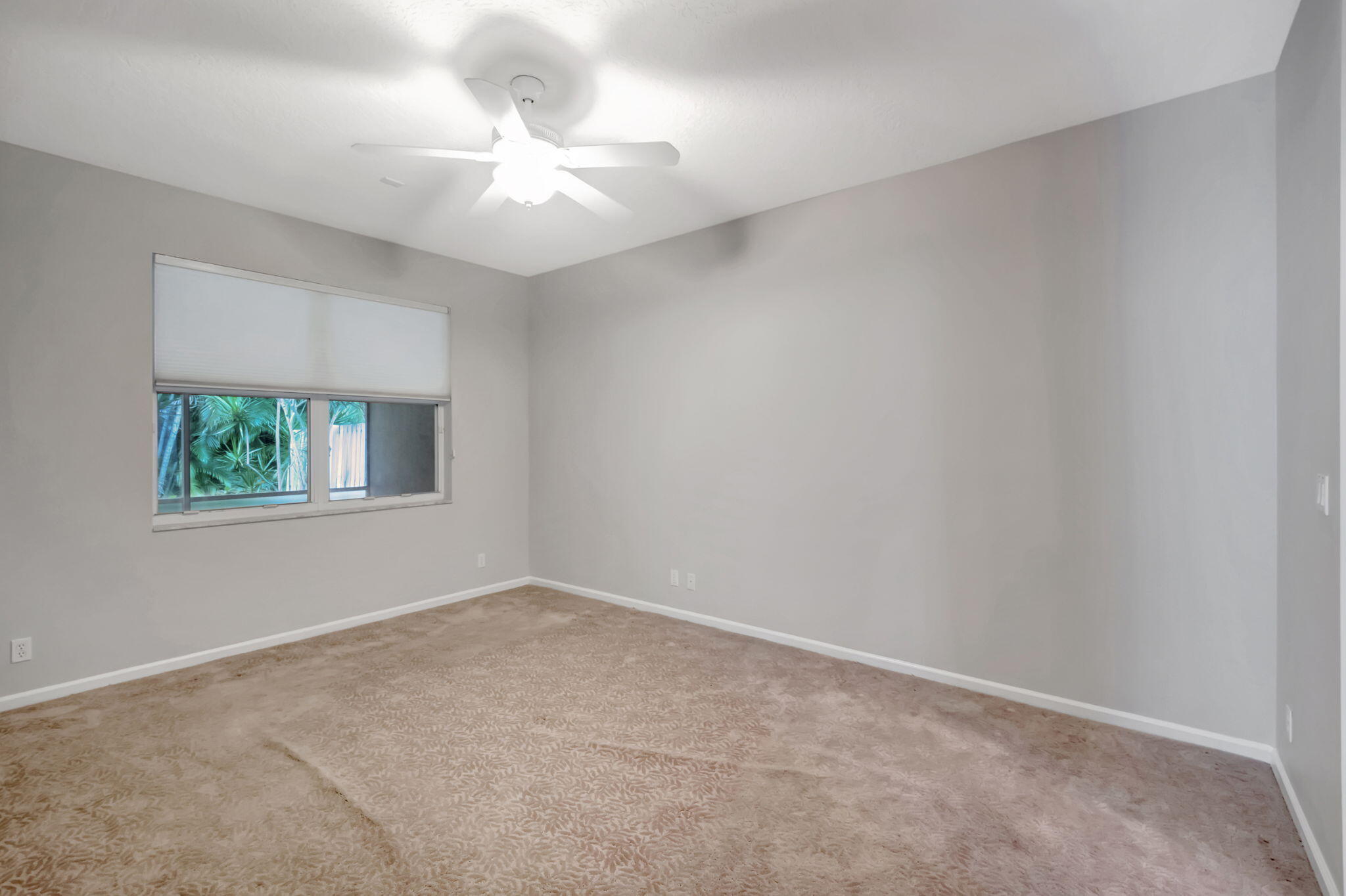 5916 Seashell Terrace Boynton Beach, FL 33437 - Photo 30 of 80 an empty room with a window and a fan