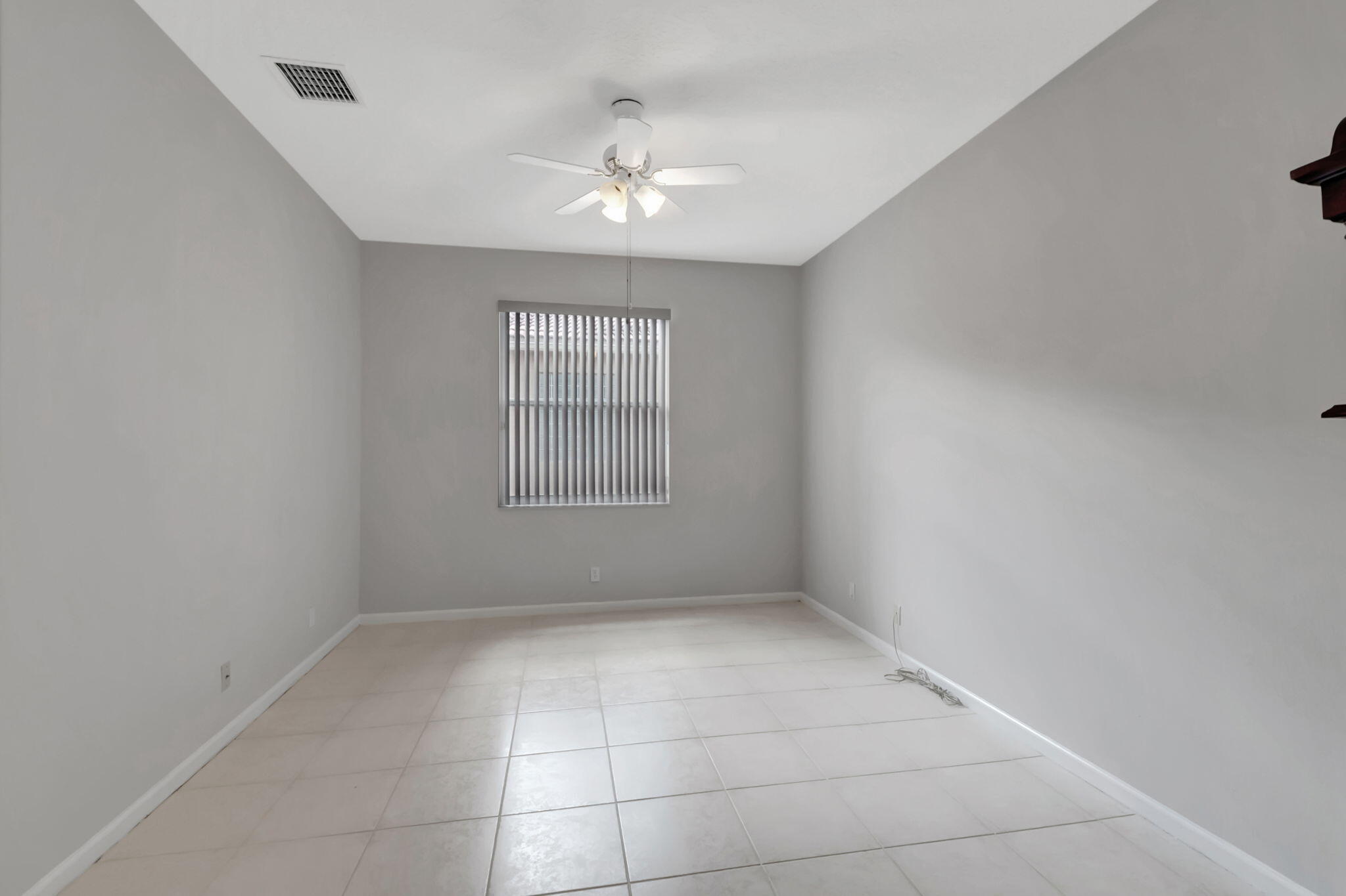 5916 Seashell Terrace Boynton Beach, FL 33437 - Photo 38 of 80 a view of an empty room with a window