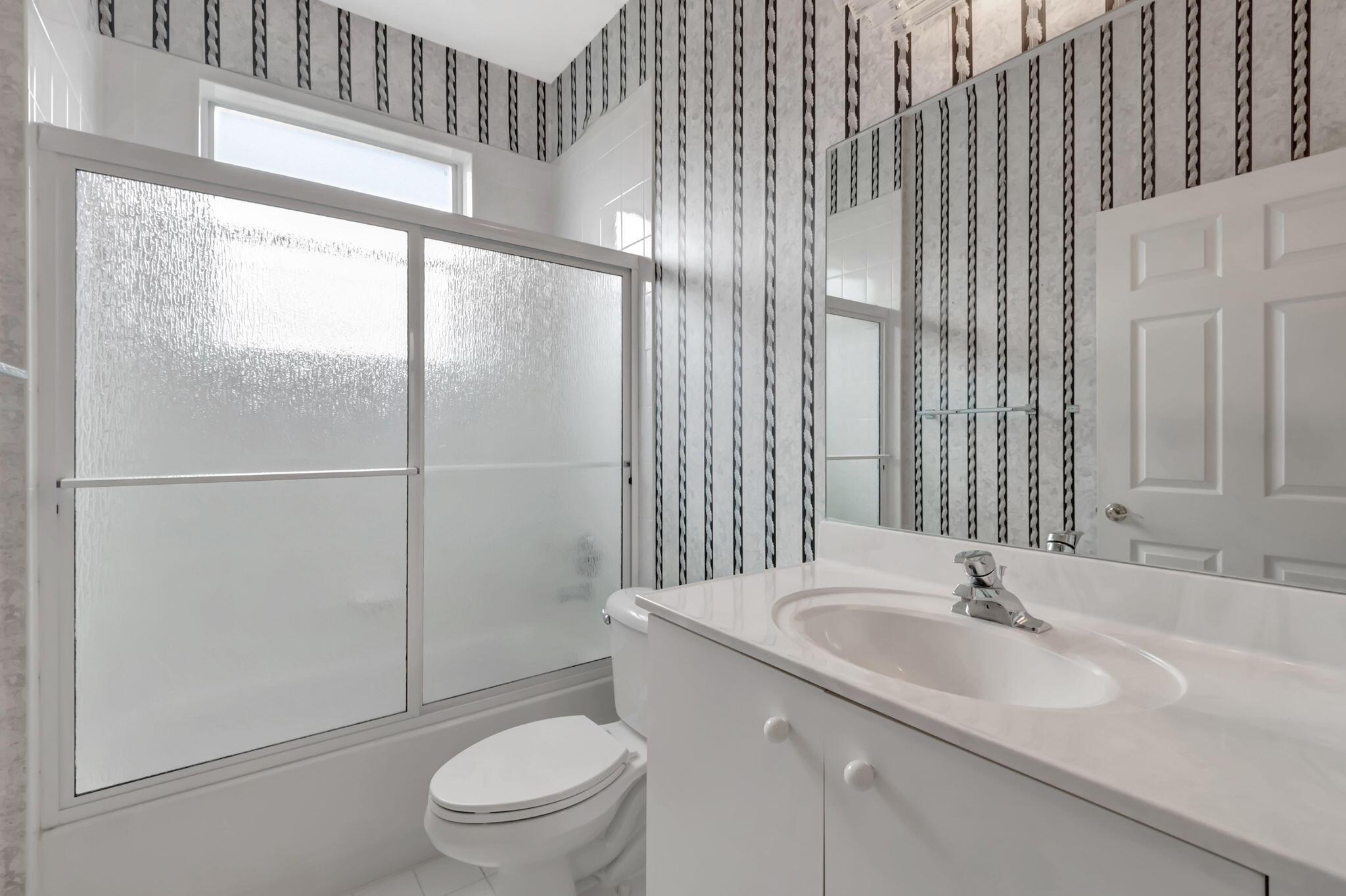 5916 Seashell Terrace Boynton Beach, FL 33437 - Photo 40 of 80 a bathroom with a sink toilet and shower