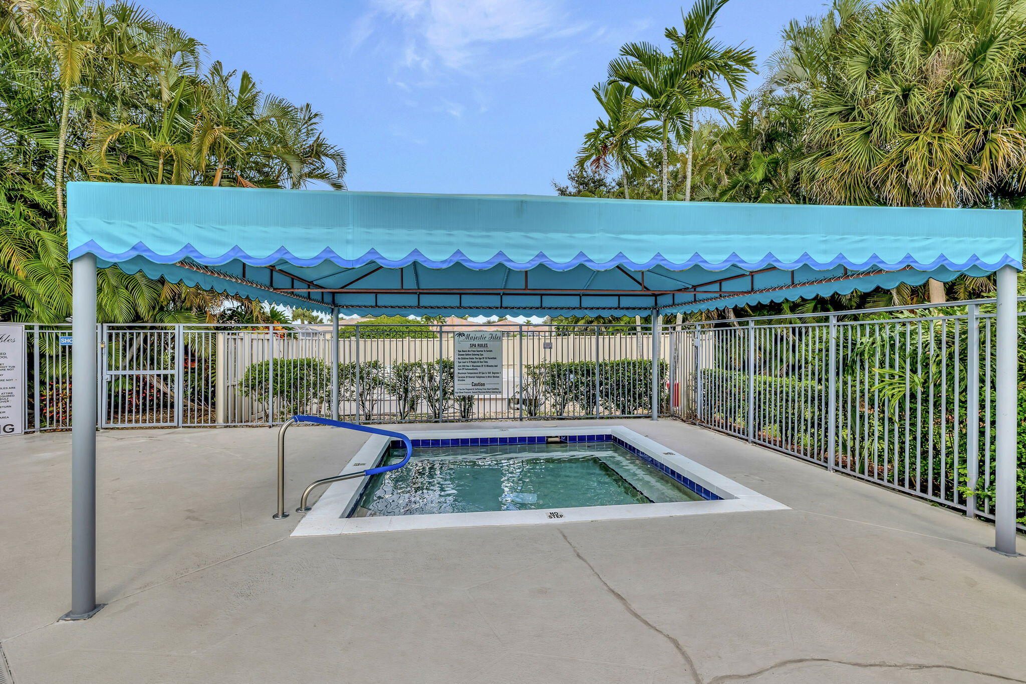 5916 Seashell Terrace Boynton Beach, FL 33437 - Photo 58 of 80 a view of a swimming pool with an outdoor seating