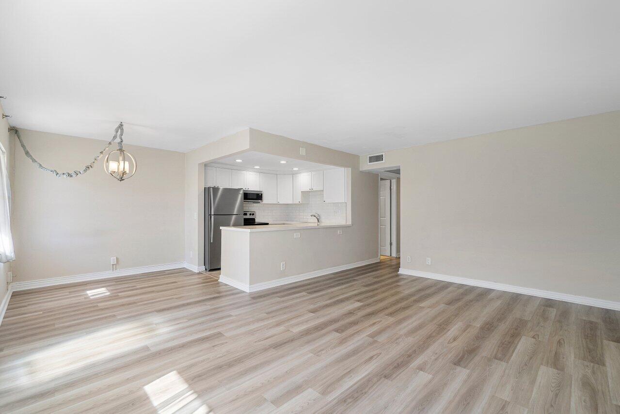 517 Fanshaw M Boca Raton, FL 33434 - Photo 12 of 28 a view of a kitchen with wooden floor