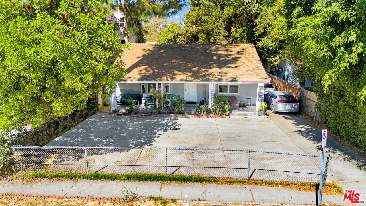 14539 Hart Street Van Nuys, CA 91405 - Photo 2 of 39 front view of a house with a porch