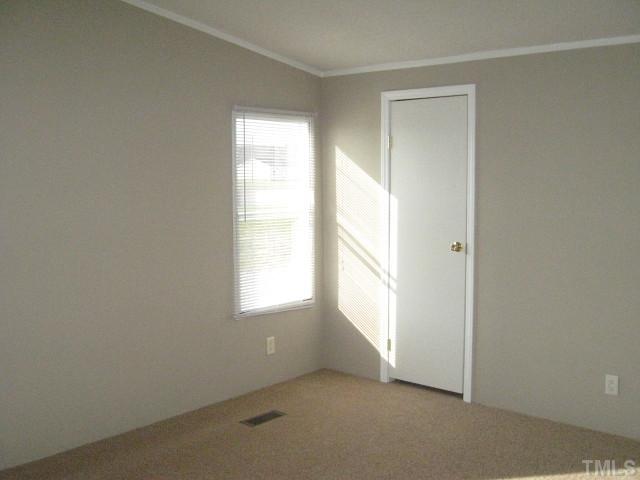 78 Isaac Trail Roxboro, NC 27574 - Photo 5 of 10 an empty room with windows