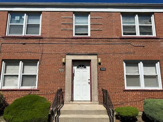 a front view of a house having yard