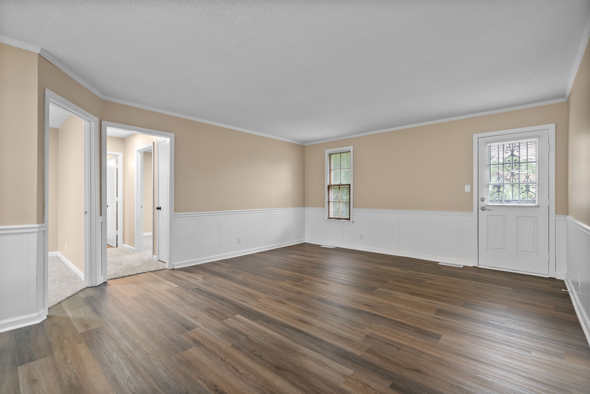 619 Ranch Hill Drive Clarksville, TN 37042 - Photo 12 of 32 an empty room with wooden floor and windows