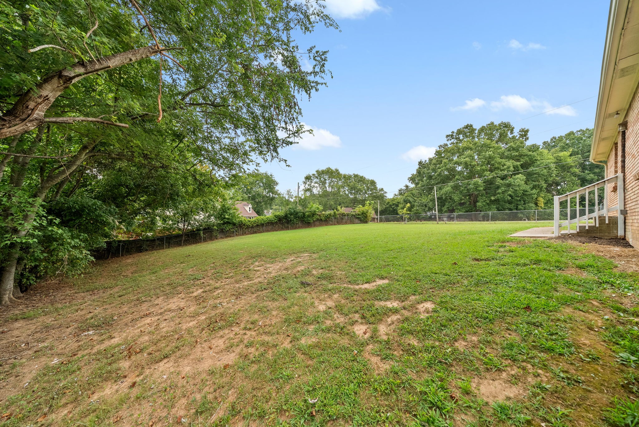 619 Ranch Hill Drive Clarksville, TN 37042 - Photo 30 of 32 a view of a field with an trees