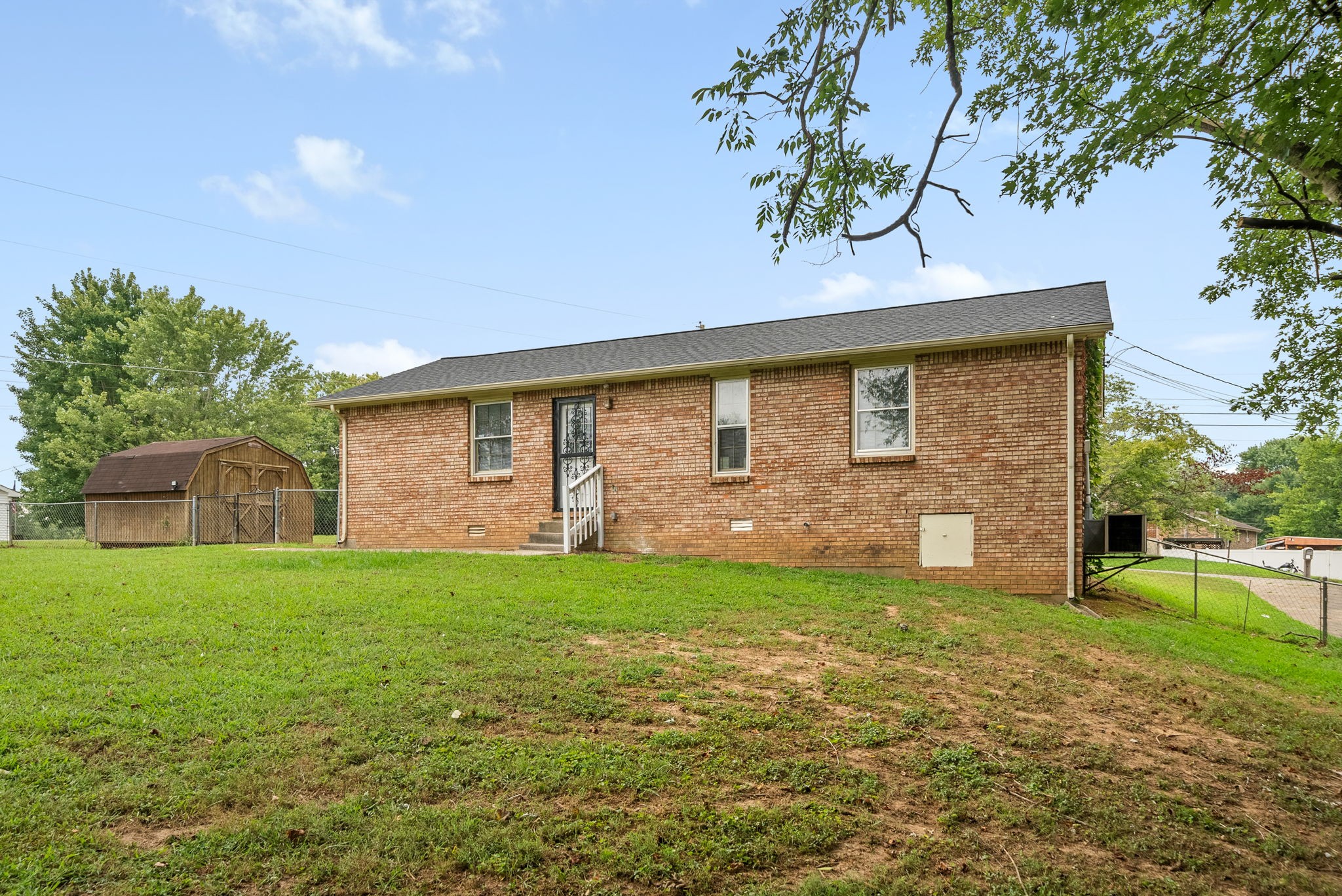 619 Ranch Hill Drive Clarksville, TN 37042 - Photo 31 of 32 a view of a house with a yard