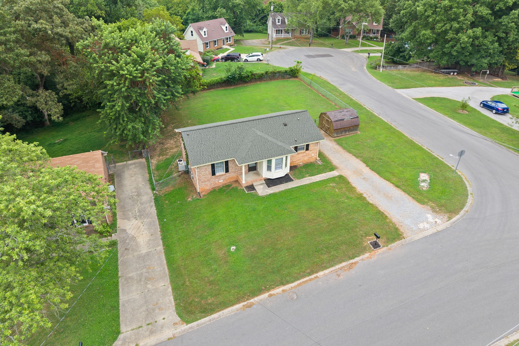 619 Ranch Hill Drive Clarksville, TN 37042 - Photo 4 of 32 an aerial view of a house with a garden and swimming pool