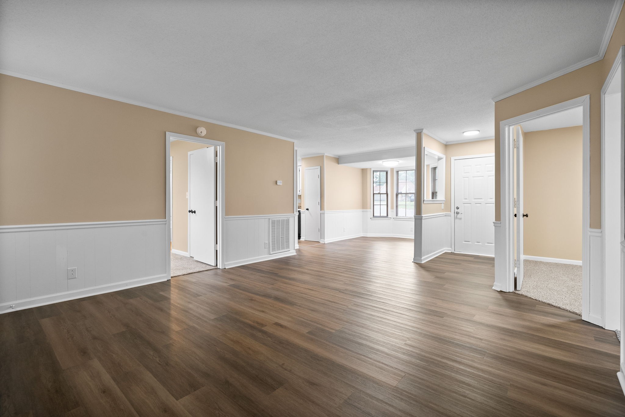619 Ranch Hill Drive Clarksville, TN 37042 - Photo 10 of 32 a view of empty room with wooden floor