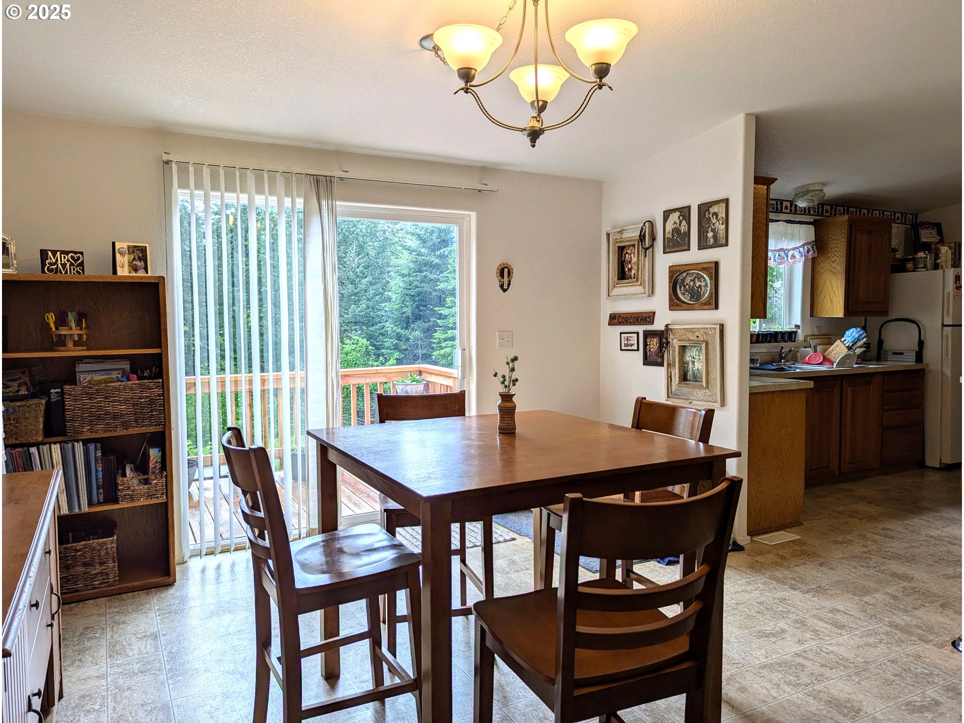 49244 Mountain View Road Oakridge, OR 97463 - Photo 21 of 30 a view of a dining room with furniture window and wooden floor